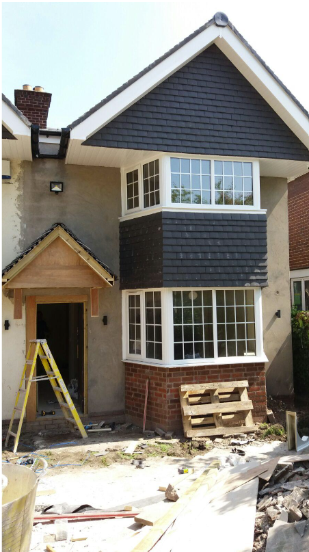 Side view of new build house during construction